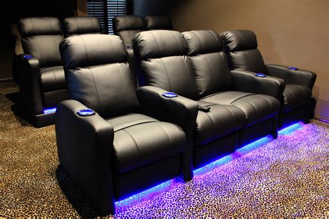 Home theater furniture - Home Theater Seating: Enjoy the movie theater experience in your own home with convenient features such as USB and AC charging, lighted cup holders, hidden in-arm storage, tray tables, and a fold down table ... Furniture base movement : Glide : Indoor/Outdoor Usage : Indoor : Form Factor : Recliner : Furniture Finish : Leather : …